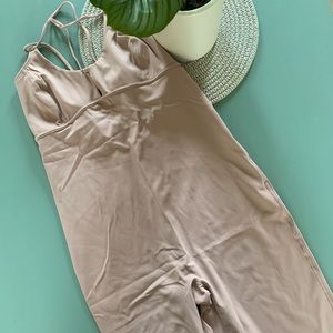 Free People Movement Glow One Piece NWT in Gypsym